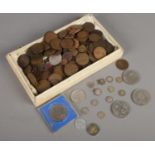 A box of mostly British pre decimal coins. Including some silver pre 1920 examples, etc.