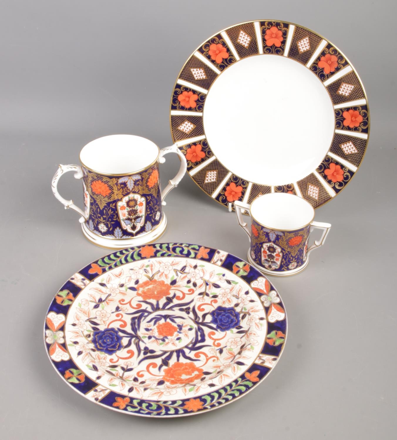 Four pieces of Imari ceramics. To include Royal Crown Derby A1314 plate, two Derby Hamilton twin