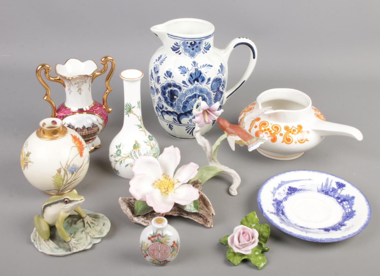 A quantity of ceramics. Including Limoges vase, Royal Worcester, Delft jug, Kaiser, Oriental scent
