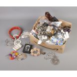 A large quantity of costume jewellery to include bracelets, necklaces, earrings, sunglasses, etc.