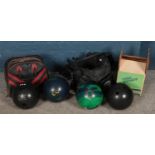 Four bowling balls. Including two AMF Amflite Magicline examples, etc.