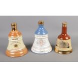 Three sealed and full Bell's Whiskey Bell Decanters including 90th birthday of the Queen Mother.