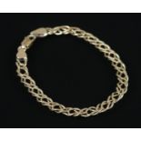 A 9ct Gold bracelet, stramped 375 to each end of clasp. Total weight: 5.4g