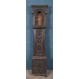 A Nineteenth Century carved oak gothic longcase clock case, for restoration. 209cm tall. No glass,