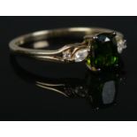 A 9ct Gold, chrome diopside and white topaz ring. Size PÂ½. Total weight: 2.1g