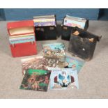 Four record carry cases containing an assortment of LPs mainly consisting of Pop and Easy Listening.