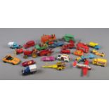 A box of diecast vehicles. Includes Corgi Toys Heinkel, Corgi Toys Whizzwheels Mini Cooper, Dinky