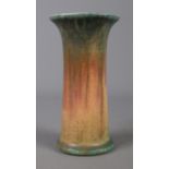 A Ruskin Pottery lily vase with blue, orange and green glaze. Date stamped 1933. Height 15cm. Good