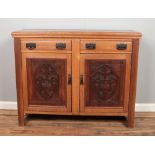 A Victorian mahogany panelled sideboard, with carved detailing to the doors. Height: 94cm, Width: