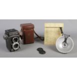A Rollei Rolleicord Franke and Heidecke Braunschweig camera in original case, together with a