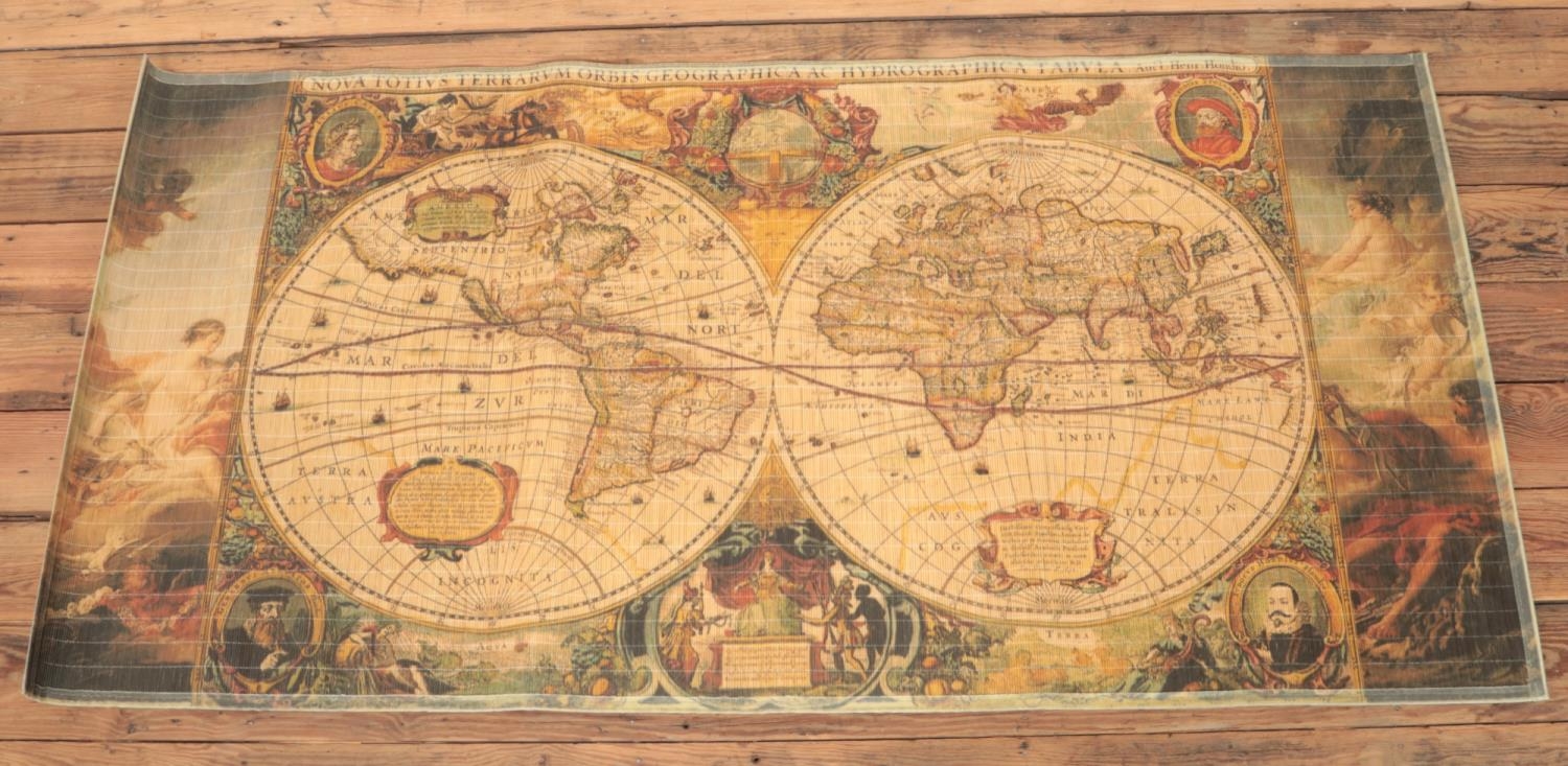 A modern bamboo/reeded tapestry mat depicting the two sides of the globe. (180cm x 90cm).