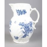 A Worcester cabbage leaf jug with Bacchus mask, scrolled handle and transfer printed floral