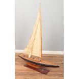 A large wooden model of a yacht. Height 130cm. CAN NOT POST.