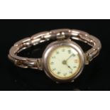 A ladies 9ct Gold manual wind cocktail wristwatch, with Swiss 15 Jewel Movement. With Arabic numeral