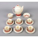 A Susie Cooper art deco Kestrel shape, banded tea service to include tea pot, sugar bowl, milk