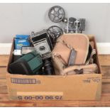 A box of assorted camera equipment, including PrinzGalaxy lens, camera bag, flash and camera related