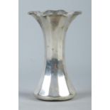 A silver fluted vase. Assayed for London, 1905 by Thomas Bradbury and Sons. Marks to the base for