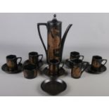 A Portmeirion 'Phoenix' coffee set. Missing one cup.