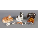 A quantity of Lomonsov figures including fawn, dog and collection of miniatures.