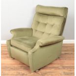 A Parker Knoll Model N30 reclining arm chair. Back castor loose.
