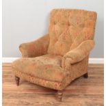 A three piece suite consisting of large sofa, arm chair and footstool.