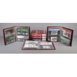 Three large and nearly full albums of Royal Mail presentation packs; 1999-2001,2002-04 and 2005-