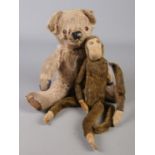 A vintage jointed monkey along with similar bear.