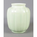 A Royal Lancastrian vase shape number 3302 in pale green glaze. Approx. height 20cm.