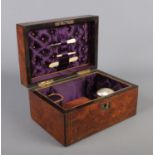 A Victorian walnut hinged box and contents. To include leather pouch, mother of pearl egg and bone