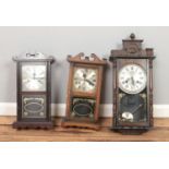 Three modern wall clocks. Includes Holly and Wood & Son examples.