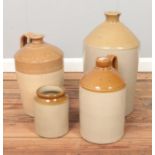 Three large stoneware flagons and similar jar. The largest flagon stamped for Roger Evans & Co,