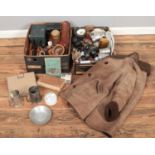 Two boxes of miscellaneous. Includes Nurseys coat, woodenware, Hardy's Anglers guide, fishing