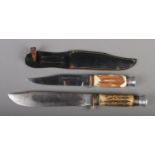 Two hunting knives. Includes Solar 'Original Bowie Knife' with leather sheath.