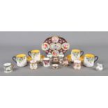 A quantity of Crown Staffordshire miniature ceramics, to include cups and saucers, small centerpiece