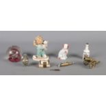 An assortment of collectables, to include glass paperweight, miniature cloisonne vase, brass desk