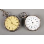 A Swiss silver pocket watch, with engine turned back and roman numeral dial, together with a Waltham
