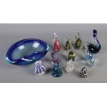 A collection of art glass to include various fish, miniature vase, elephant, etc.