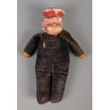 A small vintage Popeye figure.