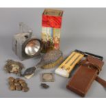 A quantity of collectables. Includes military buttons, silver mounted hand mirror, silver ARP badge,