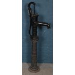 A cast iron water pump. Marked NP75. (140cm)