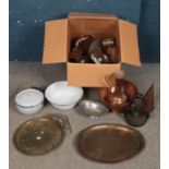 A box of metalwares. Includes large copper jug & bowl, silverplate, brass trays, etc.