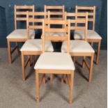 A set of six IKEA Lerhamn pine chairs.