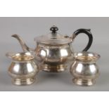 A silver three piece tea set. Assayed Birmingham 1971 by Bishton's Ltd. 546g.