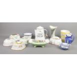 A collectiokn of Kitchenware items, including enamel cream jug, Cornishware milk jug, Sylvac 3399