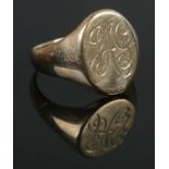 A 9ct Gold signet ring, monogrammed with 'JAG' initials. Size W. Total weight: 8.2g