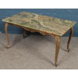 A marble top and gilt metal coffee table. (46cm x 85cm x 50cm)
