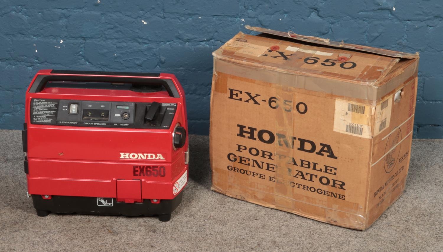 A boxed Honda EX650 generator.