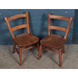 Two oak child's chairs.