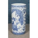 A Chinese blue and white porcelain umbrella stand. Small hole to base.