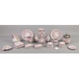 A collection of Wedgwood lilac jasperware ceramics, to include handled jug, large vase, lidded